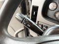 Close-up of the turn signal and windshield wiper control lever on a 2020 Peterbilt 330 dashboard