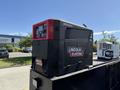 A Lincoln Electric 260MPX welder sits prominently on the back of a black truck