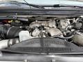 Engine of a 2008 Ford F-550 featuring a Power Stroke V8 Turbo Diesel with various electrical components and hoses visible