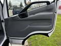 The image shows the interior driver's side door of a 2019 Hino 195 featuring a grey panel and a black handle