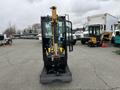 A 2024 AGT Industrial Yellow H13R Mini Excavator facing forward with a hydraulic arm and bucket extended