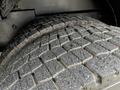 Close-up of the tread pattern on a tire from a 2009 Spartan Gladiator showcasing deep grooves and textured surface for traction