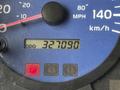 Odometer display showing a reading of 327090 miles on a Hino 268 truck dashboard with speedometer and warning lights visible