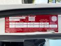 A red label attached to a 2007 GMC W3500 containing vehicle specifications and manufacturer information