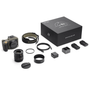 A Hasselblad X2D 100C Earth Explorer Limited Edition camera kit featuring the camera body lens strap and various accessories laid out next to the box