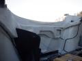 Interior view of a 2014 International Durastar showing a white panel with curved edges and black components