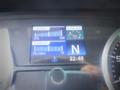 Dashboard display of a 2013 Hino 308 showing gauges for acceleration water temperature and current usage