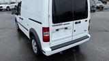 2012 Ford Transit Connect van in white parked with a plain rear view and no visible license plate