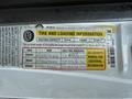 2007 Ford Econoline tire and loading information label detailing seating capacity and tire pressure recommendations