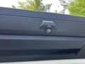 Close-up of a black handle and rearview camera on a 2020 Ford F-350 Super Duty truck