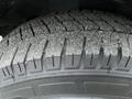 A close-up of a tire from a 2017 Chevrolet Express showing detailed tread patterns and texture