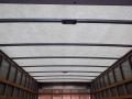 Interior view of a 2014 International Durastar truck showing the flat ceiling and metal framework without any cargo inside