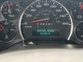 Dashboard display of a 2020 Chevrolet Express showing speedometer and engine hours reading 14145.9