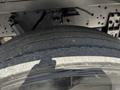 Close-up of a worn tire on a 2006 Emergency One Fire Truck showing significant tread wear and a flat surface