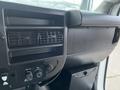 Interior dashboard of a 2017 Chevrolet Express showing air vents and control knobs for air conditioning and heating