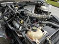 A 2013 Ford F-650 engine with various hoses wires and components visible showcasing the vehicle's mechanical features