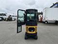 A 2024 AGT Industrial Yellow H13R Mini Excavator with a black and yellow exterior and a clear cab door open is displayed prominently in the foreground
