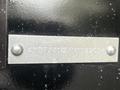 A metal identification plate attached to a 2022 Aspen Trail with the alphanumeric code 4YDTATN27NY922096 engraved on it