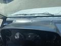 Dashboard of a 2012 Ford Econoline showing speedometer and gauges