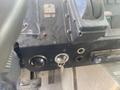 Image shows the dashboard of a 2007 Morgan Olson Workhorse W42 with various controls a steering wheel and an ignition key in the ignition slot