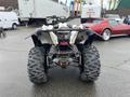 A 2017 Polaris Scrambler with large rear tires and a rugged design showcasing its off-road capabilities