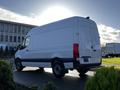 A 2021 Mercedes-Benz Sprinter van in white with a high roof and large cargo space is positioned at an angle showing its rear and side details