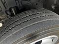 Close-up of a tire from a 2019 Hino 195 showcasing tread pattern and texture