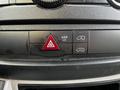 Dashboard controls of a 2017 Mercedes-Benz Sprinter featuring hazard lights ASR off button and settings for sliding doors