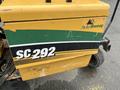 A yellow and green 2014 Vermeer Corporation Sweep Stump Cutter with the model number SC 292 displayed prominently on the side