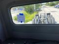 Interior view of a 2008 Peterbilt 340 showing the empty cabin with a view of the truck's chassis through the rear window