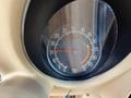 A close-up view of a 1970 Chevrolet Corvette speedometer displaying the RPM gauge with a needle indicating 15 RPM
