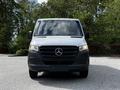 A 2020 Mercedes-Benz Sprinter van with a sleek front design featuring the iconic three-pointed star emblem and black grille