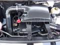 A close-up view of the engine compartment of a 2016 Mercedes-Benz Sprinter showing the air intake system and various engine components