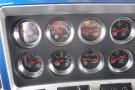 Dashboard of a 2015 Kenworth T660 showing various gauges including fuel pressure and brake indicators