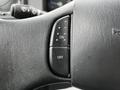 Close-up of a Ford F-650 steering wheel control with two buttons labeled ON and OFF