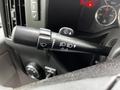 A black turn signal and headlight control stalk from a 2019 Chevrolet Express showing various switches and indicators