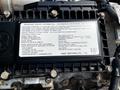 A Hino 155 engine information plate displaying important details about the engine model specifications and adjustments