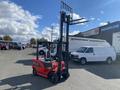 A red and black 2024 AGT KFE20 forklift with a tall mast and lifting forks positioned upward