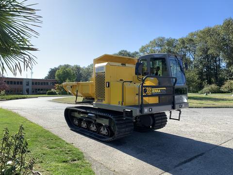 A 2022 TerraMac Tracked Dump with a yellow body and tracks designed for off-road transport of materials