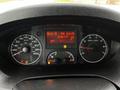 Dashboard of a 2018 RAM Promaster showing speedometer fuel gauge and digital display with trip information and warning lights