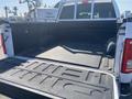 The image shows the open bed of a 2017 Ford F-150 with a black lining and no visible cargo inside
