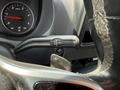 Close-up of the gear shift controls in a 2019 Mercedes-Benz Sprinter showing options for park reverse neutral and drive along with an engine start button