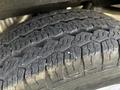 Close-up of a tire from a 2017 Ford Transit showcasing detailed tread patterns and surface texture