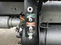Close-up of a 2008 International 7500 displaying three colored valves labeled Primary Tank Secondary Wet Tank