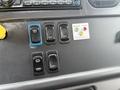 Dashboard controls of a 2016 Freightliner 108SD featuring various buttons for light test and other operations