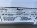2016 Jayco 265RLSW trailer specifications label showing weight ratings dimensions and other manufacturer details