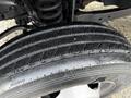 Close-up of a tire on a 2017 Ford F-450 Super Duty showing tread patterns and details of the rim
