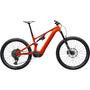 A 2026 Specialized Turbo Levo 4 Comp mountain bike with an orange frame featuring wide tires a suspension fork and an electric motor integrated into the frame
