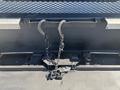 Close-up of a hitch on a 2018 International DuraStar featuring two heavy-duty metal hooks connected by a chain