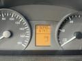Dashboard of a 2009 Dodge Sprinter Van displaying a trip odometer reading of 076990 kilometers and a total distance of 674.7 kilometers